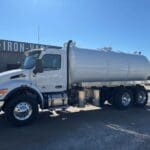 IN STOCK - 2025 Peterbilt 548 Sewer / Septic Truck - Iron-Vac 4200 Gallon Carbon Steel Tank Tank Body