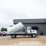 IN-STOCK 2025 Mack MD7 Sewer Septic Truck – 2,500 Gallon Hoisted Tank