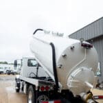 IN-STOCK 2025 Mack MD7 Sewer Septic Truck – 2,500 Gallon Hoisted Tank